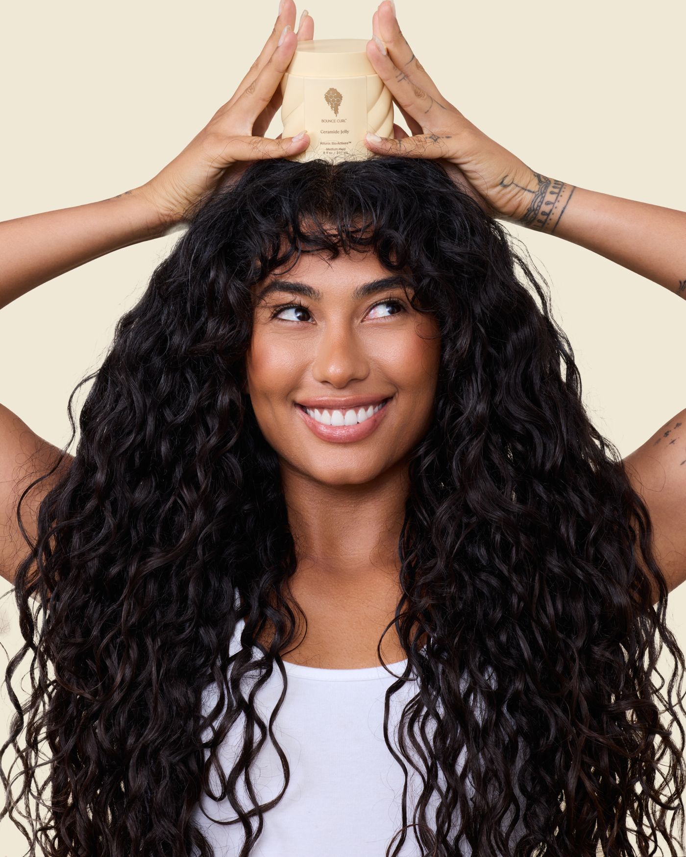Woman with long curly hair